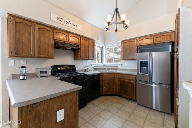 10892 Reef Sands Dr, El Paso, TX 79924 - kitchen featuring a peninsula, under cabinet range hood, a sink, black appliances, and an inviting chandelier