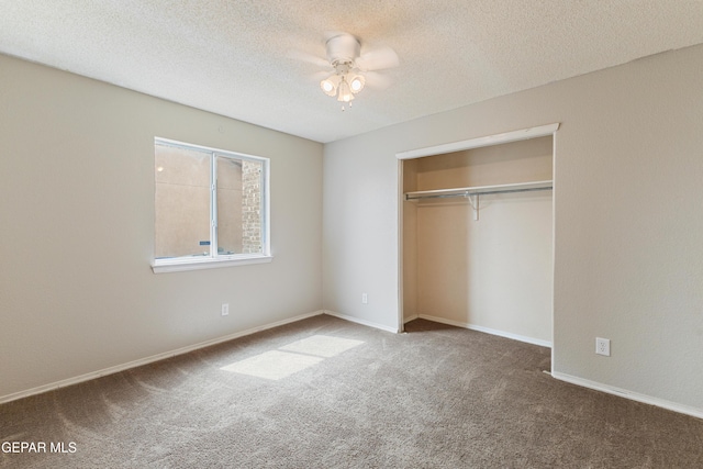 10892 Reef Sands Dr, El Paso, TX 79924 - unfurnished bedroom featuring carpet flooring, baseboards, a closet, and a textured ceiling