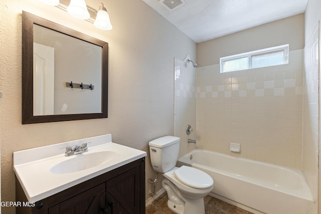 10892 Reef Sands Dr, El Paso, TX 79924 - full bathroom featuring toilet, vanity, shower / bathtub combination, visible vents, and a textured wall