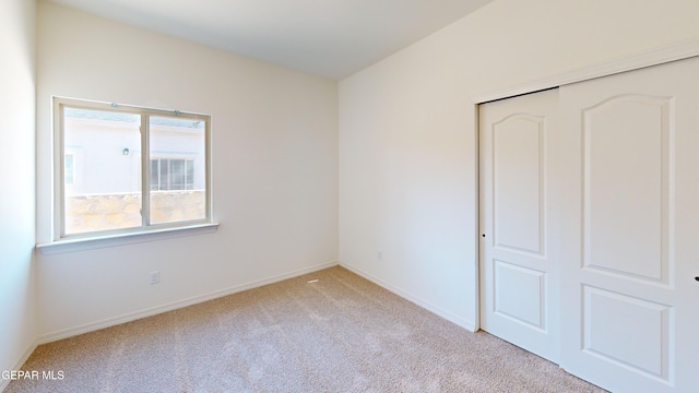 14764 Jack White Ave, El Paso, TX 79938 - unfurnished bedroom featuring carpet flooring and a closet