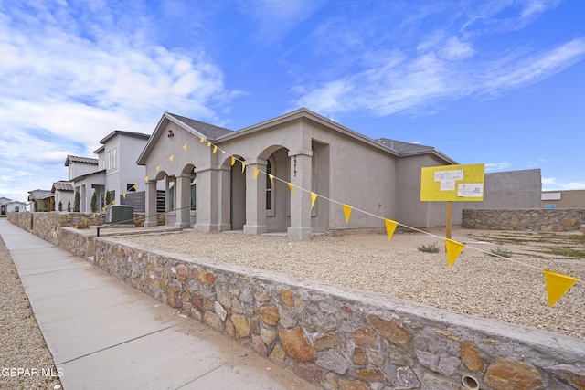 2217 Tony Harper St, El Paso, TX 79938 - view of front of property featuring stucco siding