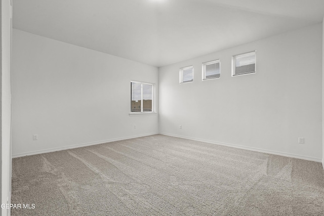 2217 Tony Harper St, El Paso, TX 79938 - carpeted spare room featuring baseboards