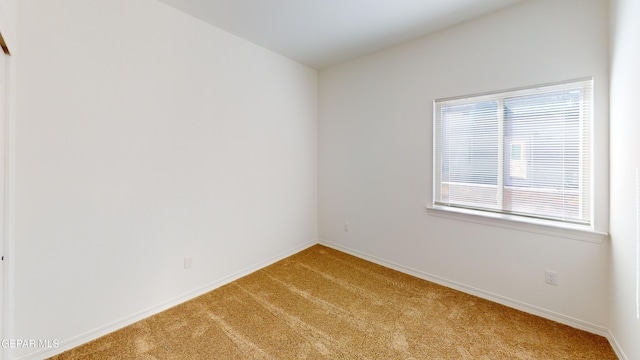 2237 Tony Harper St, El Paso, TX 79938 - empty room featuring light colored carpet and baseboards