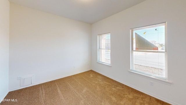 2237 Tony Harper St, El Paso, TX 79938 - spare room with baseboards and light carpet