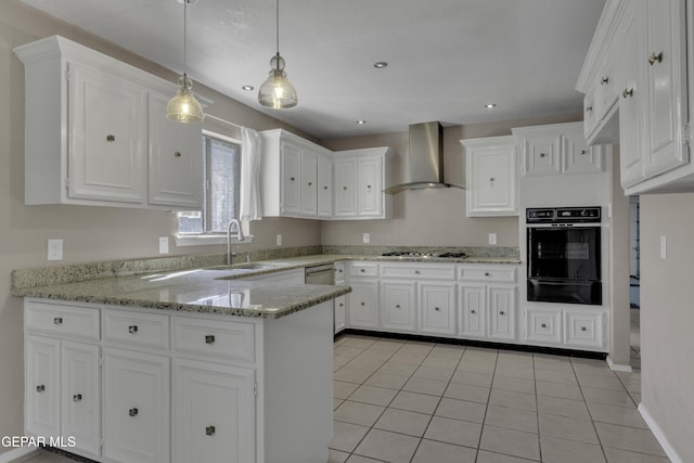 4945 Vista Grande Cir, El Paso, TX 79922 - kitchen featuring a sink, wall chimney exhaust hood, a warming drawer, gas stovetop, and oven