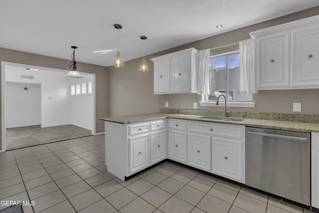 4945 Vista Grande Cir, El Paso, TX 79922 - kitchen featuring white cabinets, visible vents, a peninsula, dishwasher, and a sink