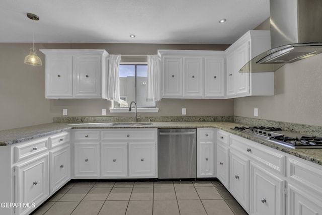 4945 Vista Grande Cir, El Paso, TX 79922 - kitchen featuring wall chimney range hood, a sink, white cabinetry, and appliances with stainless steel finishes