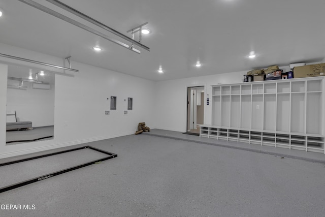 4945 Vista Grande Cir, El Paso, TX 79922 - garage with baseboards and electric panel