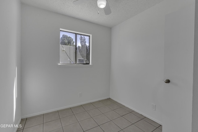 4945 Vista Grande Cir, El Paso, TX 79922 - spare room featuring a ceiling fan, baseboards, and a textured ceiling