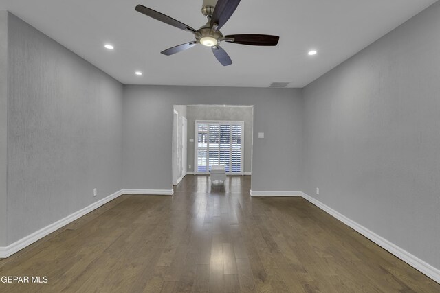 4945 Vista Grande Cir, El Paso, TX 79922 - spare room featuring a ceiling fan, dark wood-type flooring, baseboards, and visible vents
