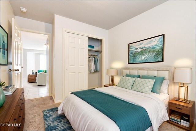 14181 Peyton Edwards Ave, El Paso, TX 79938 - carpeted bedroom with a closet and baseboards