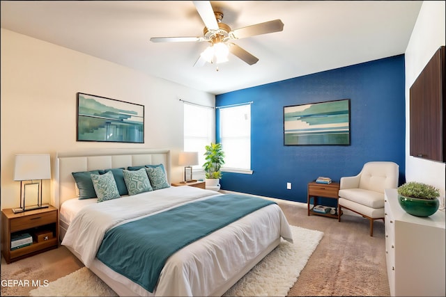 14181 Peyton Edwards Ave, El Paso, TX 79938 - bedroom featuring light colored carpet, ceiling fan, and baseboards