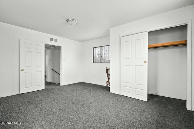 9005 Electra Dr, Canutillo, TX 79835 - unfurnished bedroom with visible vents, a closet, and dark carpet