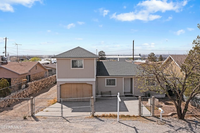 9005 Electra Dr, Canutillo, TX 79835 - view of front of property with concrete driveway, a gate, a garage, and a fenced front yard
