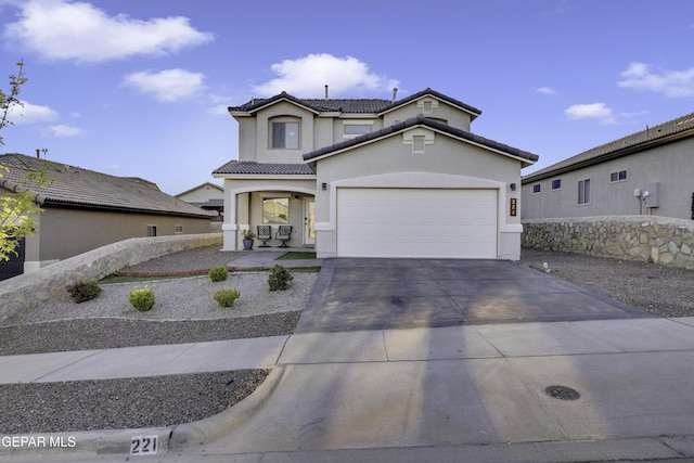 221 Ilchester Way, El Paso, TX 79928 - view of front of property featuring a tile roof, stucco siding, a garage, and concrete driveway