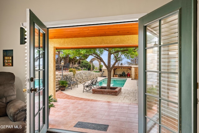 interior space featuring an outdoor pool