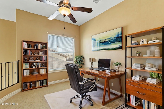 office area featuring visible vents, baseboards, and ceiling fan