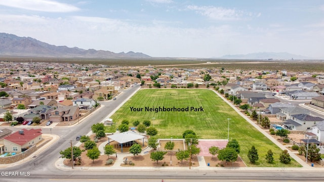 aerial view with a mountain view and a residential view