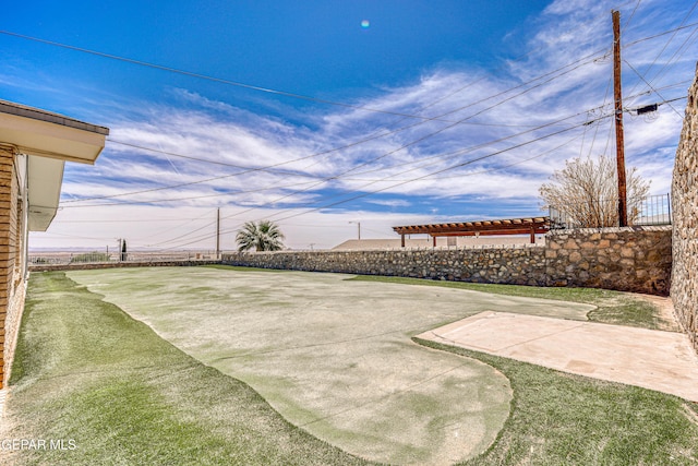 view of yard with a patio and fence