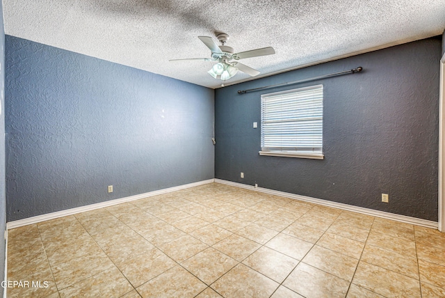 unfurnished room with a textured ceiling, a textured wall, a ceiling fan, and tile patterned floors