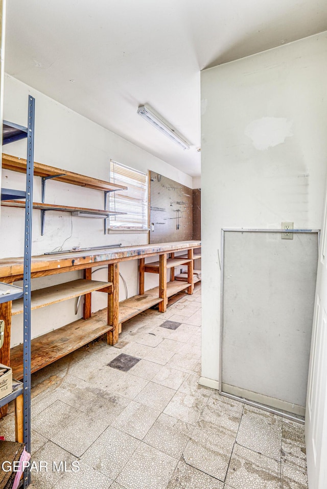 interior space featuring a workshop area