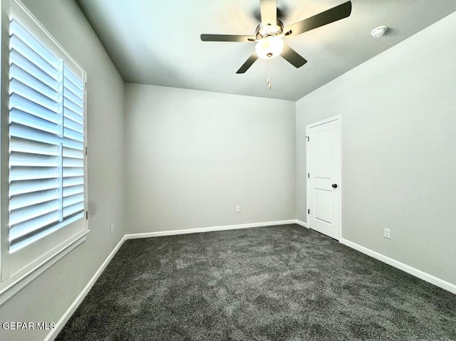 14613 Tierra Nectar Ave, El Paso, TX 79938 - empty room featuring a ceiling fan, baseboards, plenty of natural light, and dark carpet