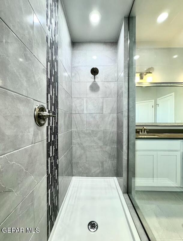 14613 Tierra Nectar Ave, El Paso, TX 79938 - full bath with vanity, recessed lighting, and tiled shower
