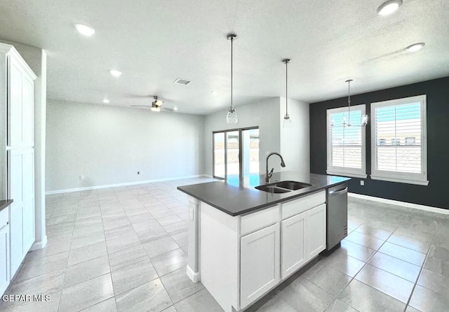 14613 Tierra Nectar Ave, El Paso, TX 79938 - kitchen with a sink, dark countertops, plenty of natural light, and stainless steel dishwasher