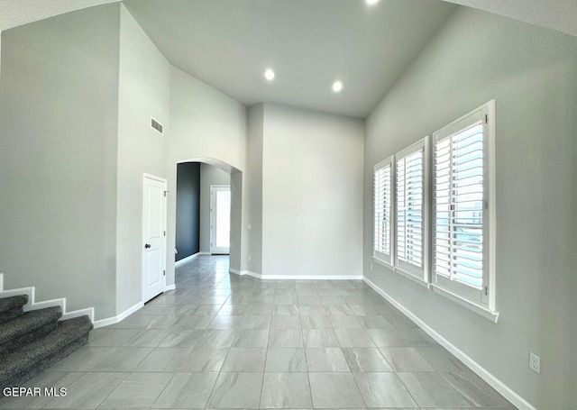 14613 Tierra Nectar Ave, El Paso, TX 79938 - empty room with arched walkways, baseboards, visible vents, and recessed lighting