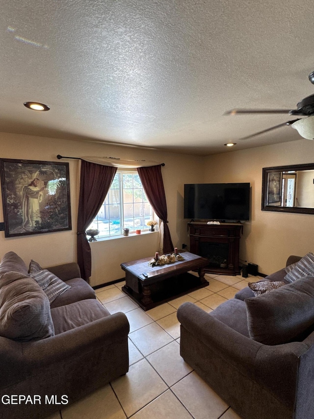 121 Compa Dr, Tornillo, TX 79853 - living area with light tile patterned floors, a textured ceiling, a ceiling fan, and recessed lighting