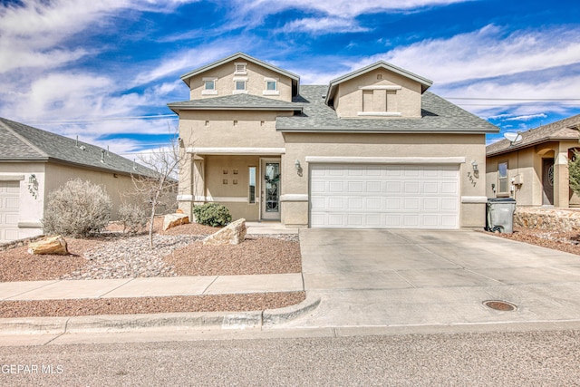 view of front facade with a shingled roof, driveway, stucco siding, and an attached garage