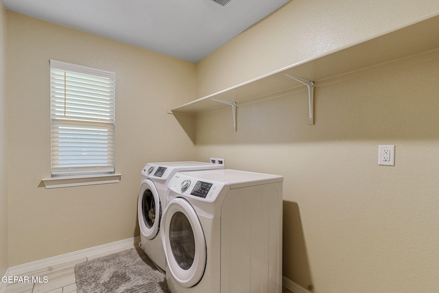 14717 Tierra Escape Ave, El Paso, TX 79938 - washroom featuring washing machine and dryer and baseboards