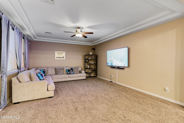 14717 Tierra Escape Ave, El Paso, TX 79938 - carpeted living area with a tray ceiling, ceiling fan, and baseboards