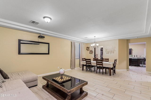 14717 Tierra Escape Ave, El Paso, TX 79938 - living area featuring a chandelier, baseboards, and wood tiled floors