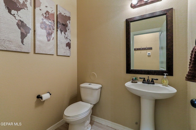 14717 Tierra Escape Ave, El Paso, TX 79938 - half bathroom with toilet and baseboards