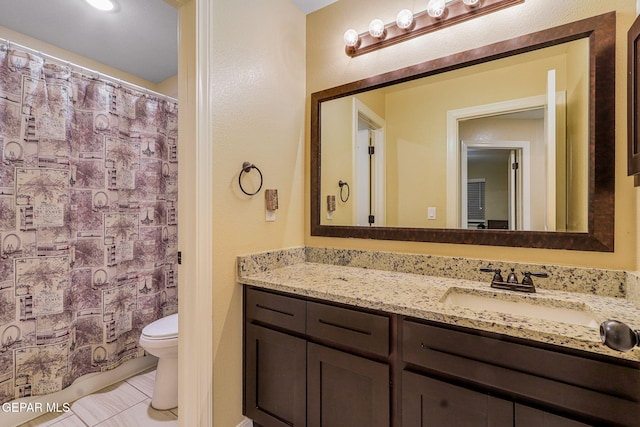 14717 Tierra Escape Ave, El Paso, TX 79938 - full bathroom with toilet, tile patterned flooring, vanity, and a shower with curtain