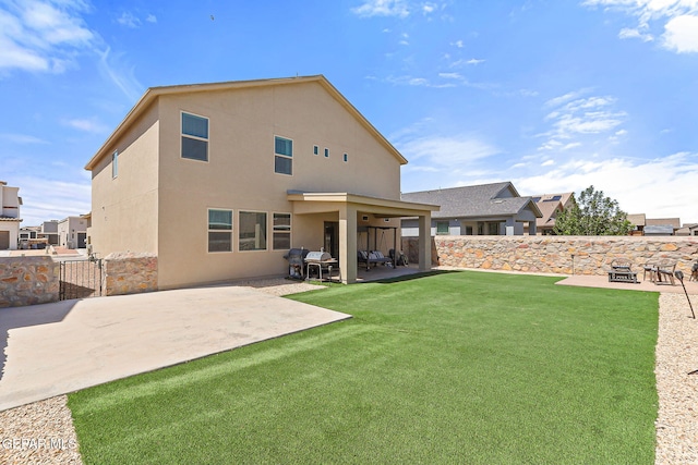 14717 Tierra Escape Ave, El Paso, TX 79938 - rear view of property with a patio area, stucco siding, and an outdoor fire pit