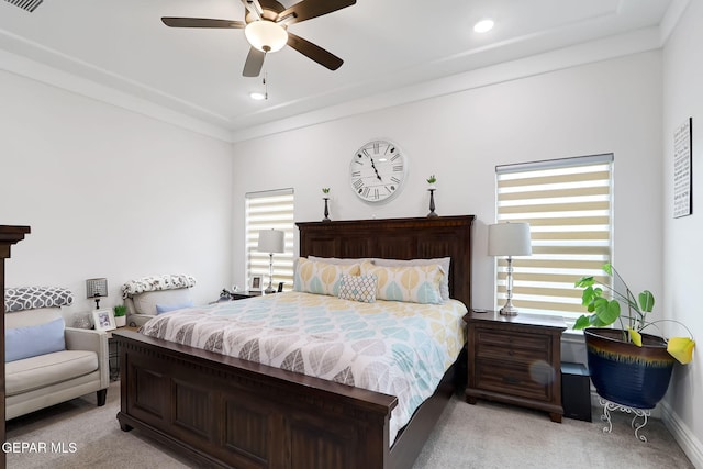 bedroom featuring a ceiling fan, visible vents, recessed lighting, light carpet, and baseboards