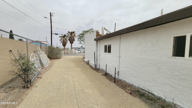 231 Francis St, El Paso, TX 79905 - view of street featuring driveway