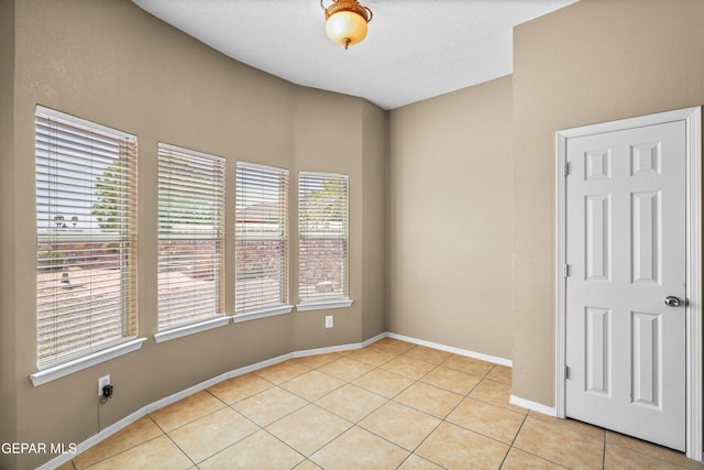 2987 Tierra Limon Dr, El Paso, TX 79938 - empty room featuring light tile patterned floors and baseboards
