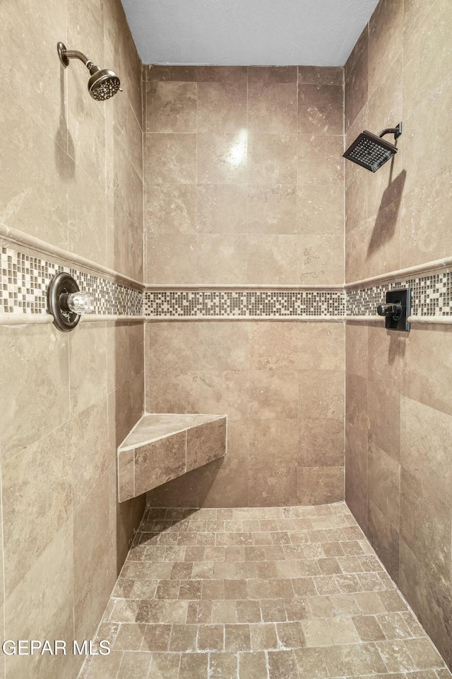 2987 Tierra Limon Dr, El Paso, TX 79938 - bathroom featuring a tile shower