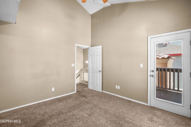 2987 Tierra Limon Dr, El Paso, TX 79938 - carpeted spare room featuring ceiling fan, baseboards, and high vaulted ceiling