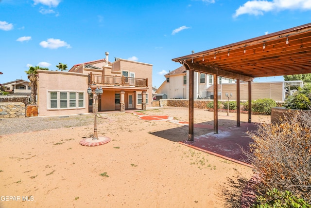 2987 Tierra Limon Dr, El Paso, TX 79938 - back of property featuring a patio, stucco siding, and a balcony