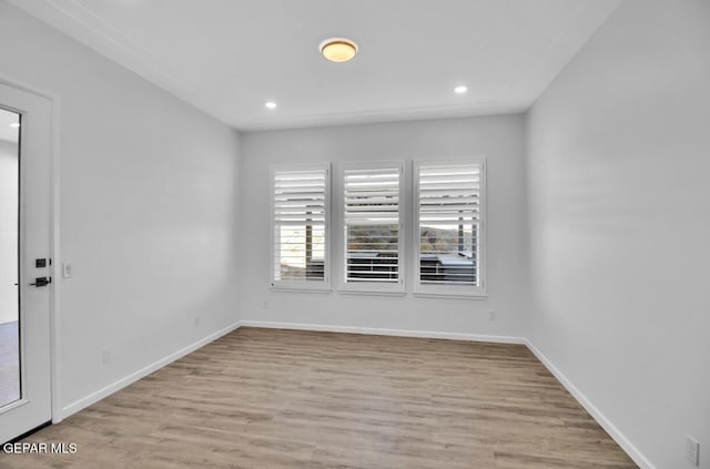 1846 Pommel Pl, El Paso, TX 79911 - unfurnished room with recessed lighting, light wood-type flooring, and baseboards