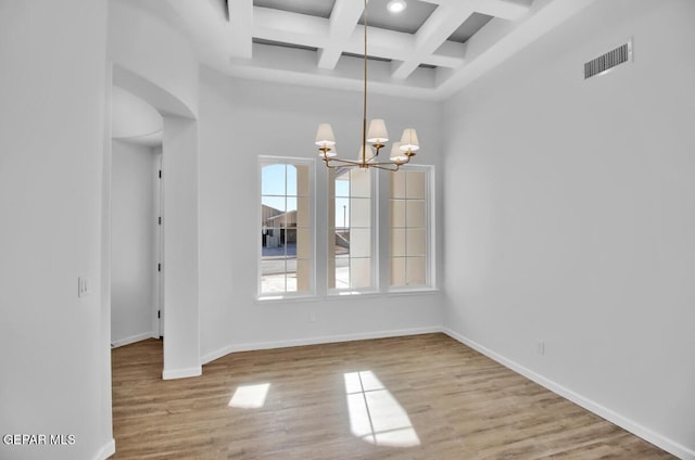 1846 Pommel Pl, El Paso, TX 79911 - unfurnished dining area with beam ceiling, baseboards, visible vents, a chandelier, and wood finished floors