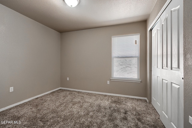 10677 Canyon Sage Dr, El Paso, TX 79924 - carpeted empty room with baseboards