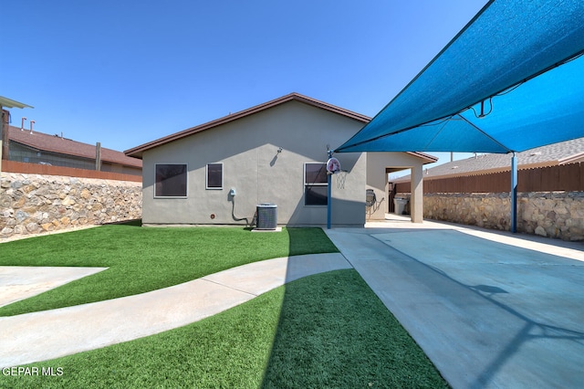 10677 Canyon Sage Dr, El Paso, TX 79924 - back of house with stucco siding, a patio, and central AC unit