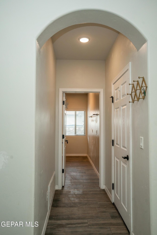756 Jalynn Grace, Canutillo, TX 79835 - hall featuring dark wood finished floors, arched walkways, and recessed lighting