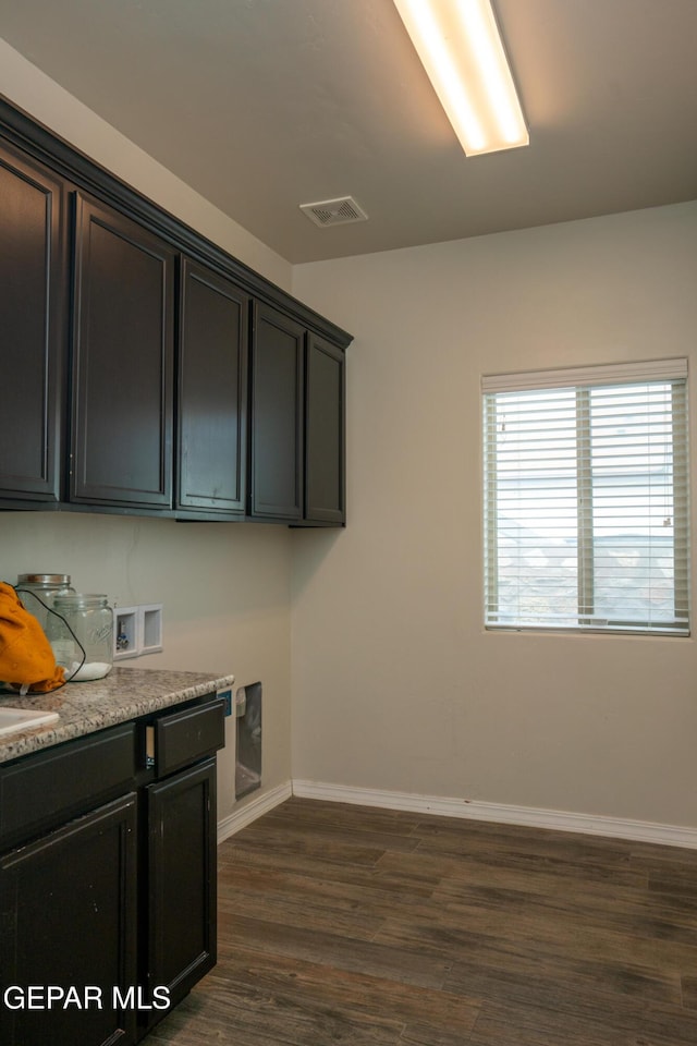 756 Jalynn Grace, Canutillo, TX 79835 - laundry area featuring cabinet space, dark wood-type flooring, and washer hookup
