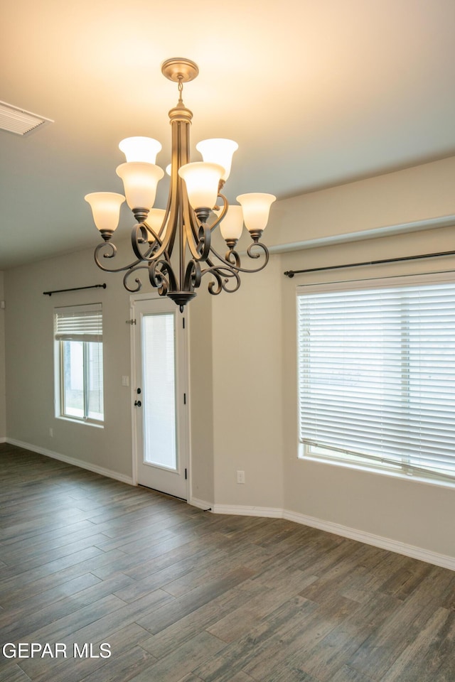 756 Jalynn Grace, Canutillo, TX 79835 - spare room with dark wood-style flooring and a chandelier
